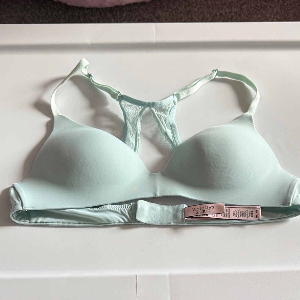 Victoria's Secret light blue lace racer back bra. 34A. New. Never worn.